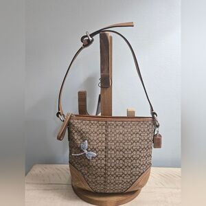 Coach Brown and Tan Shoulder Bag Strap Has Been Cut Shorter